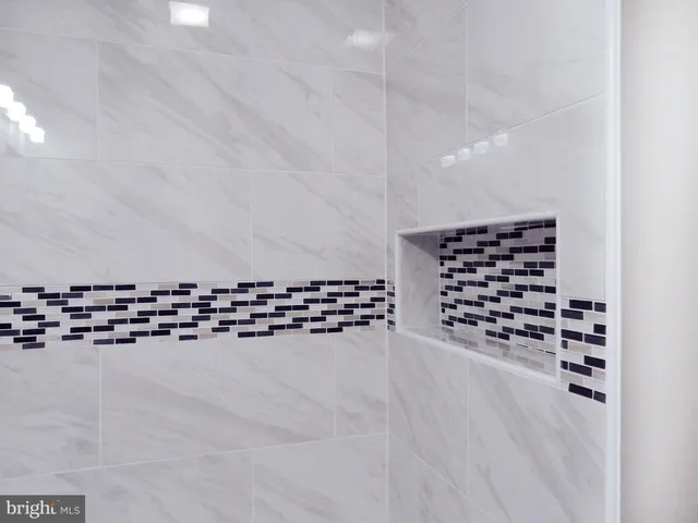 view of a room with wooden shelves