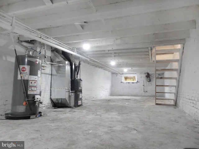 a view of a house with wooden floor and stairs