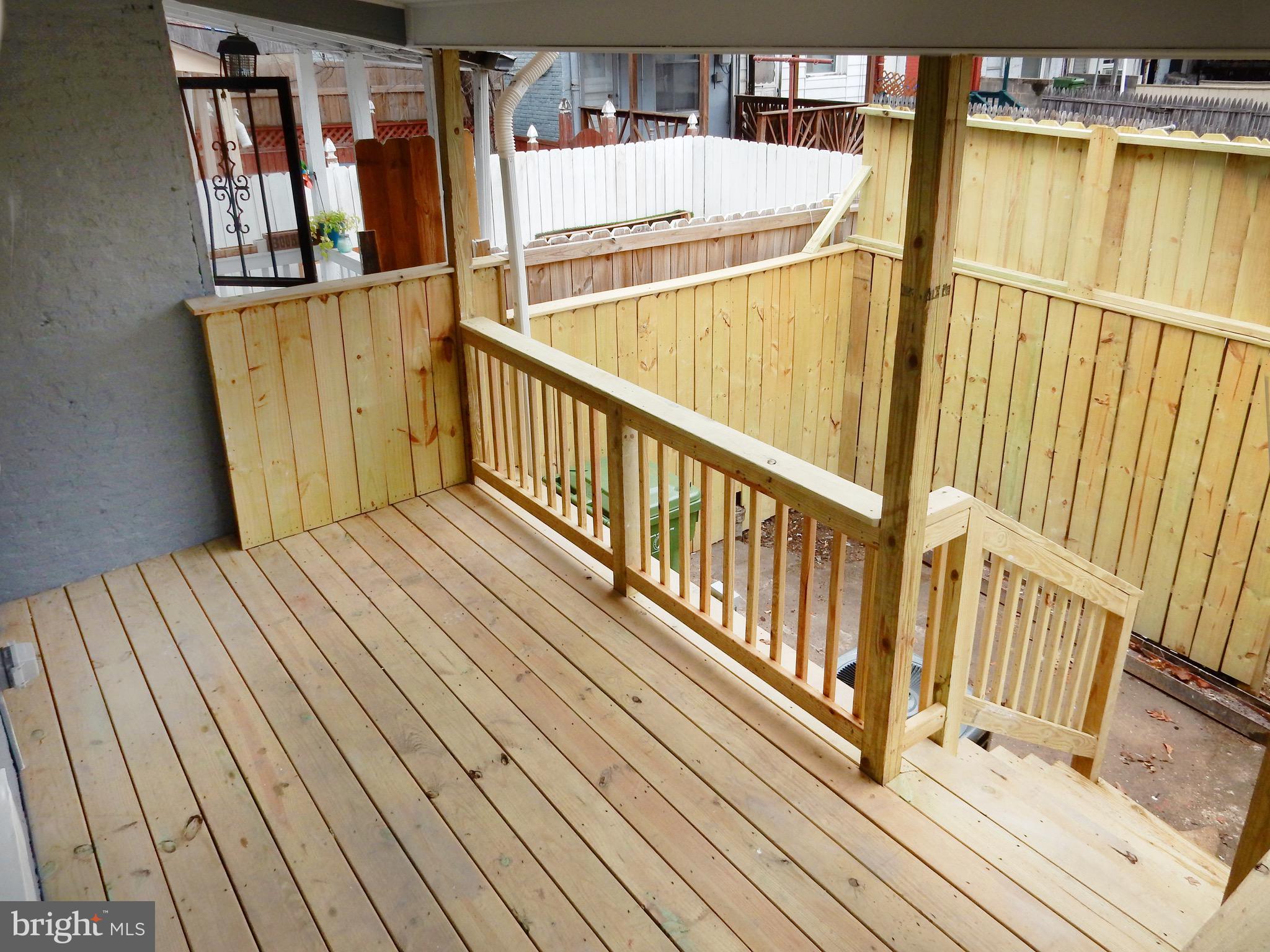1111 Bayard Street Baltimore, MD 21223 - Photo 35 of 39 a view of a balcony with wooden floor