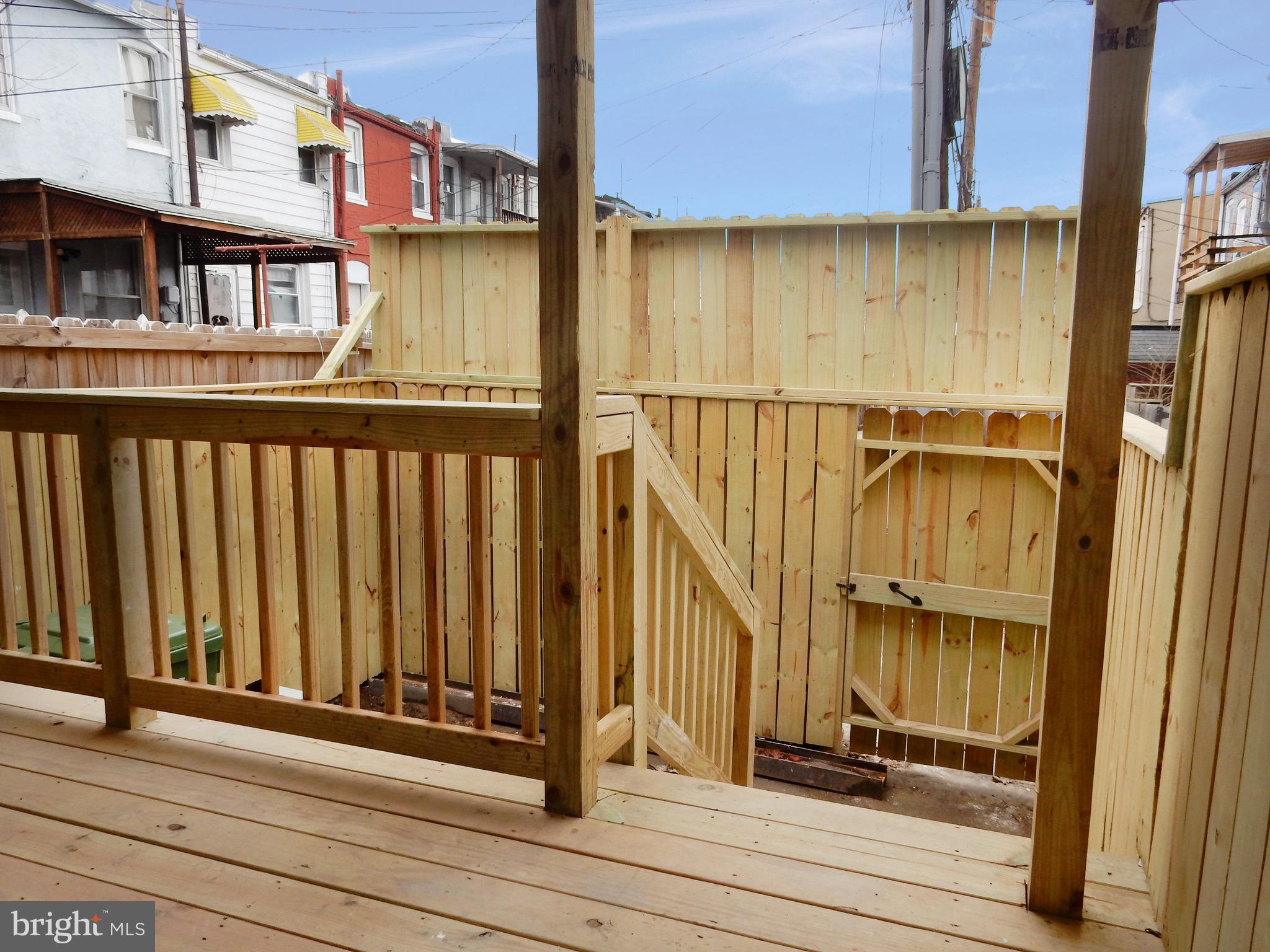 1111 Bayard Street Baltimore, MD 21223 - Photo 36 of 39 a view of a balcony with a door