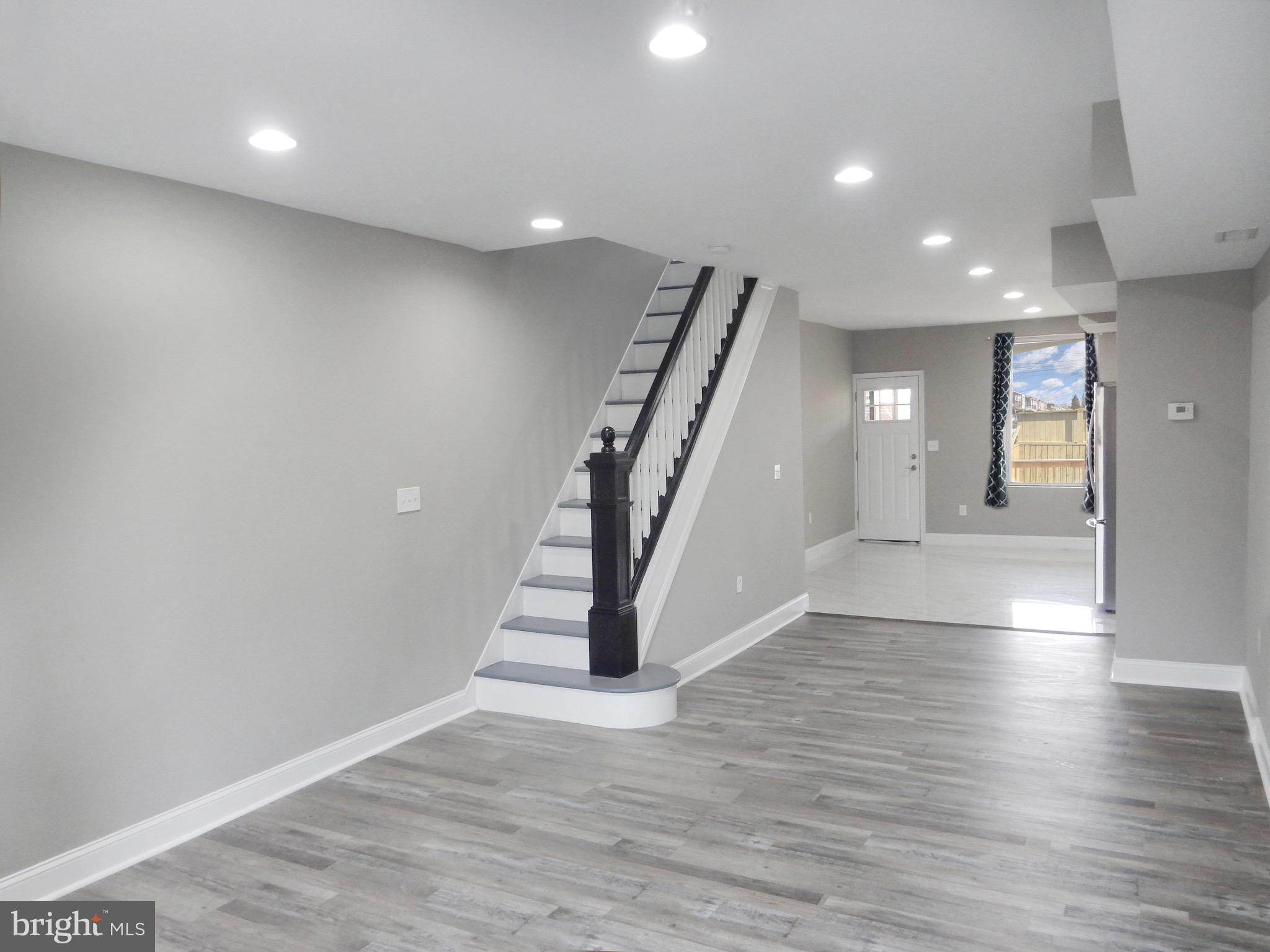 1111 Bayard Street Baltimore, MD 21223 - Photo 4 of 39 a view of entryway with wooden floor