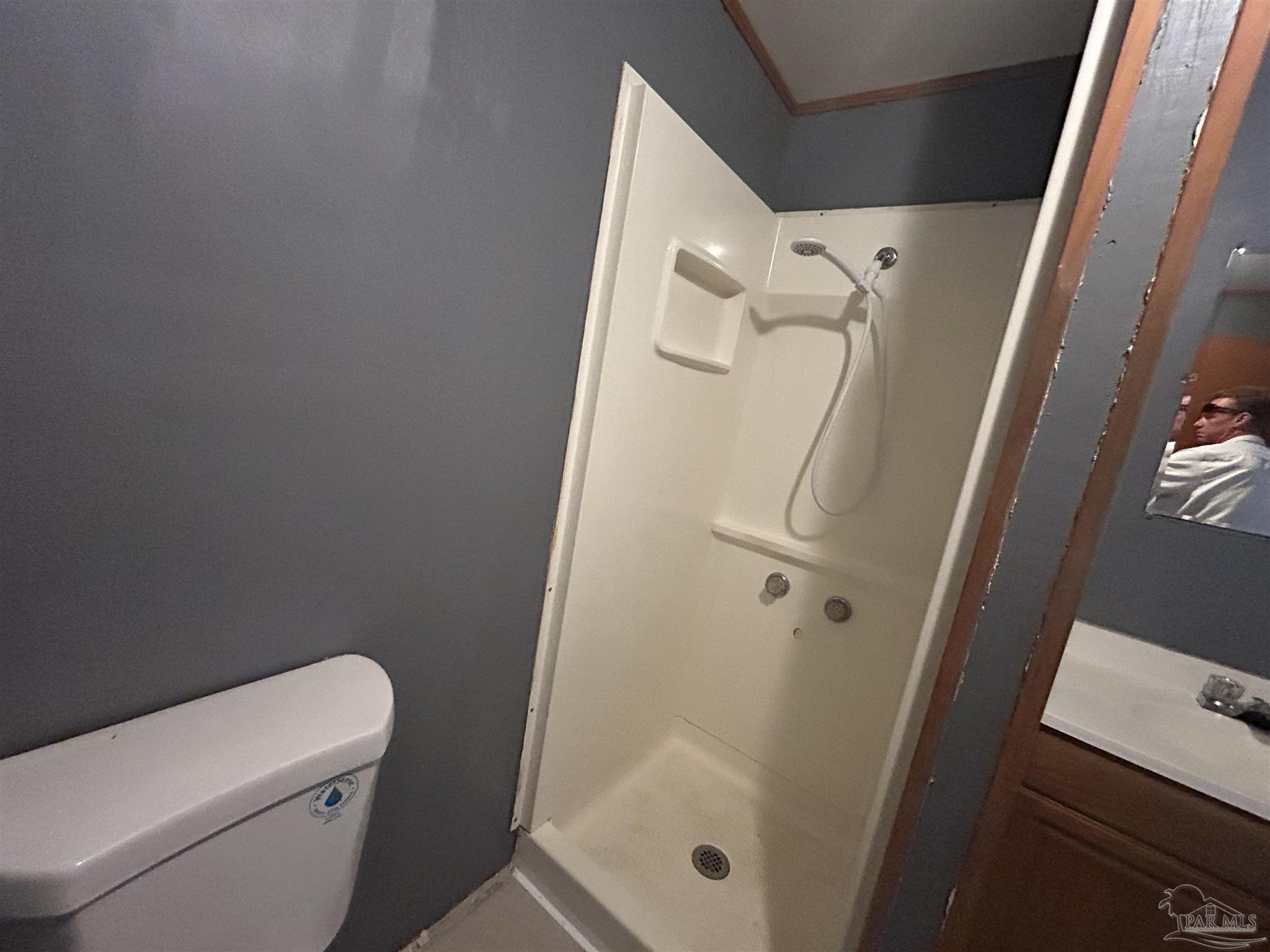 210 Milton Road Pensacola, FL 32507 - Photo 13 of 17 a bathroom with a shower and toilet