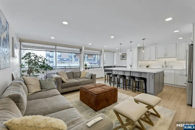 a view of balcony with couch and chairs
