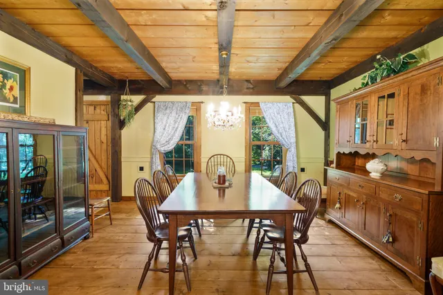 a kitchen with a sink and wooden cabinets