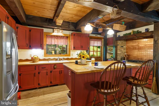 a bedroom with bed and a window