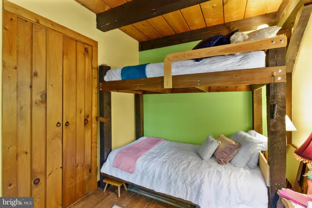 a view of balcony with couch and wooden floor
