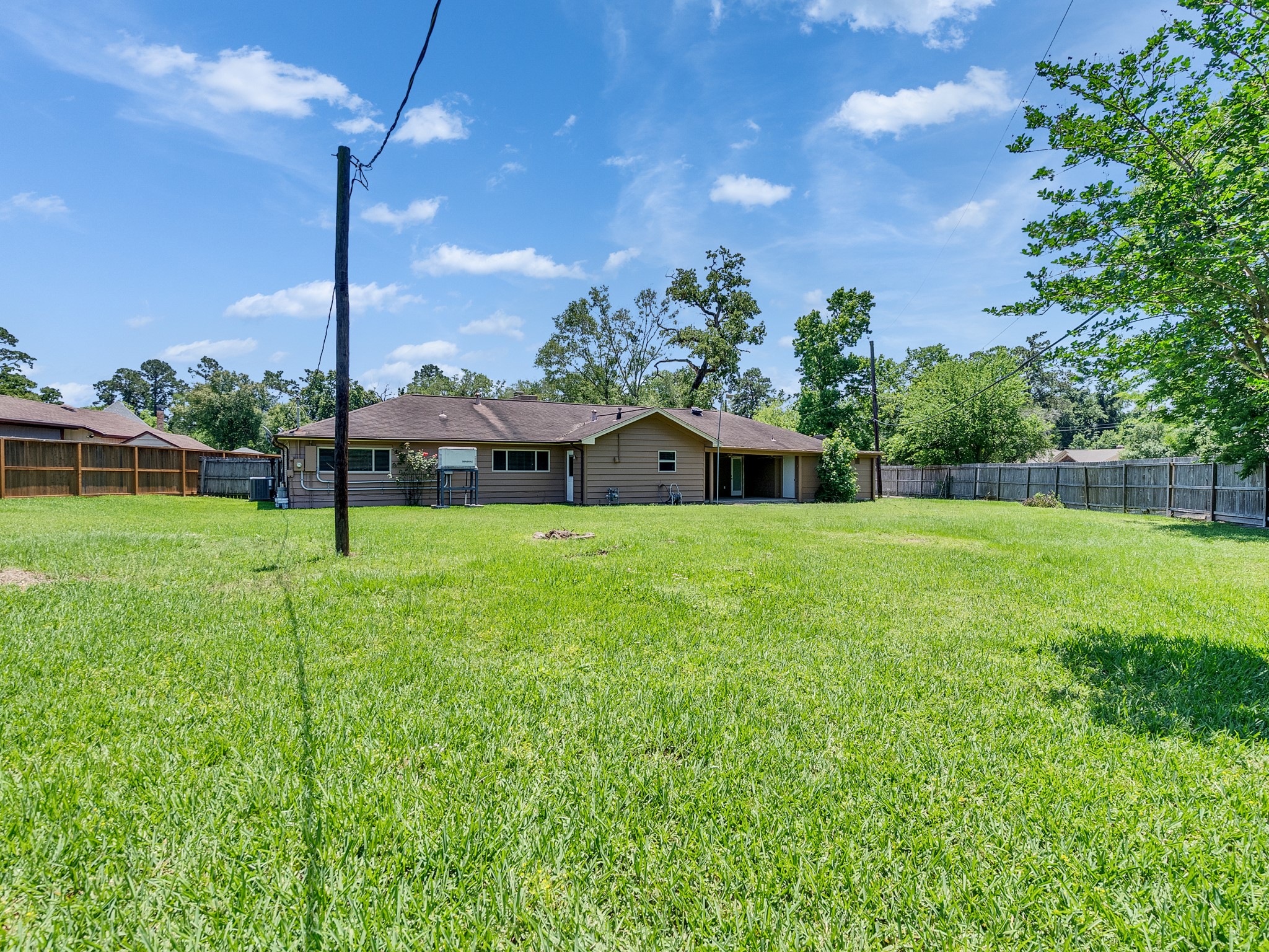 603 Casper Court Spring, TX 77373 - Photo 28 of 31 This back yard could host a football game! Almost.