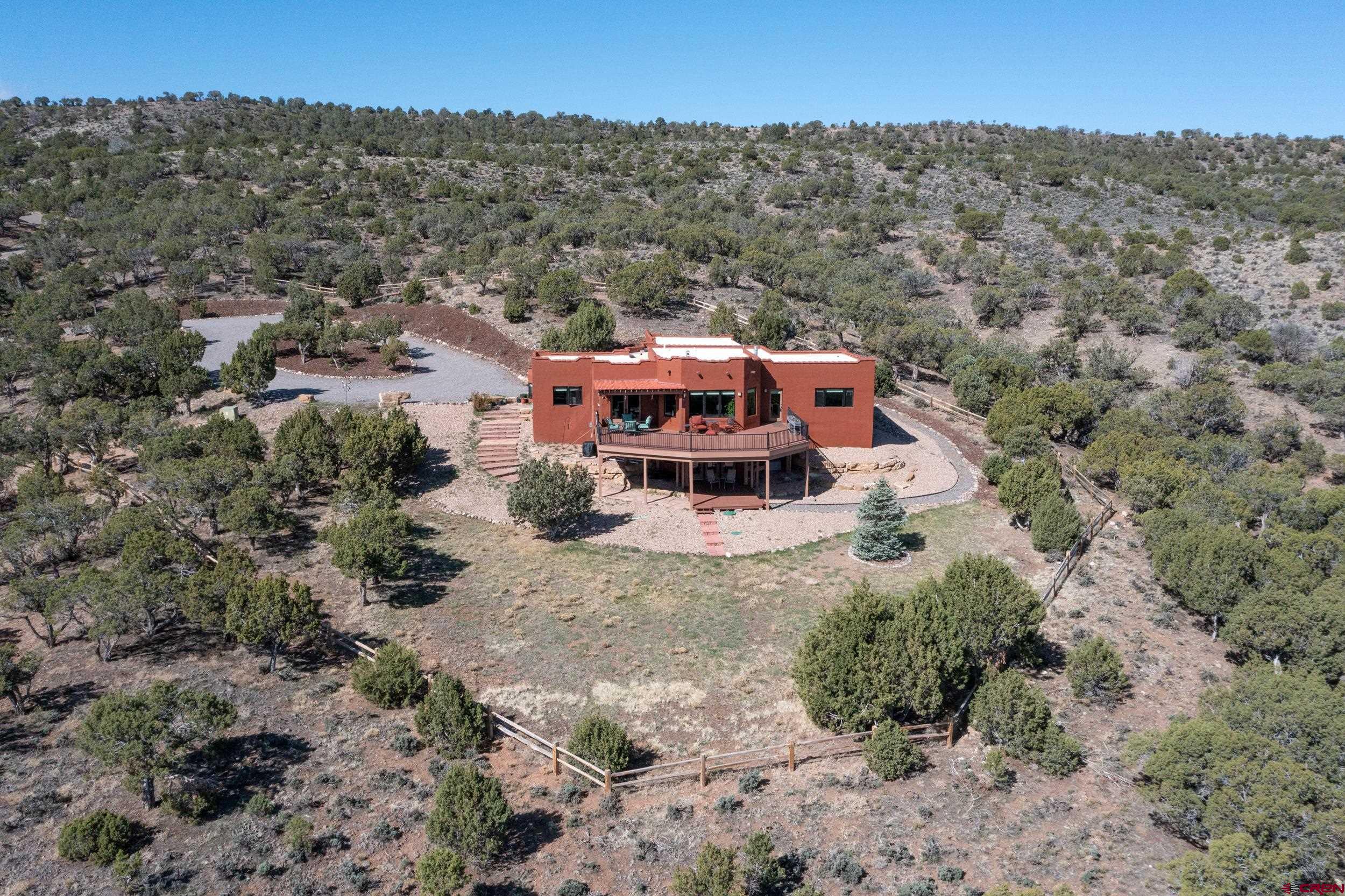 20891 Solitude Road Montrose, CO 81403 - Photo 29 of 39 an aerial view of a house with a yard