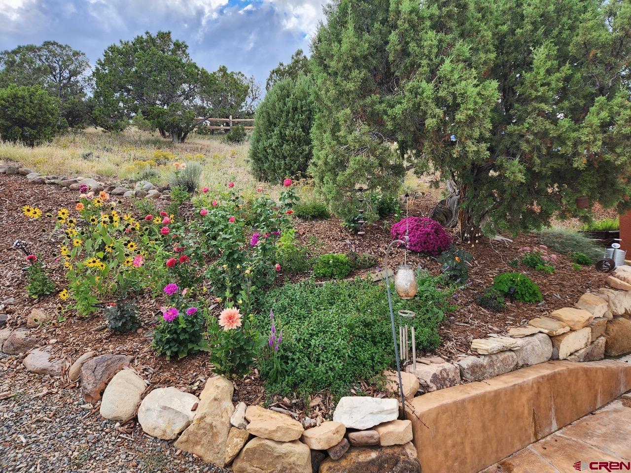 20891 Solitude Road Montrose, CO 81403 - Photo 36 of 39 a view of a table and chair in the patio