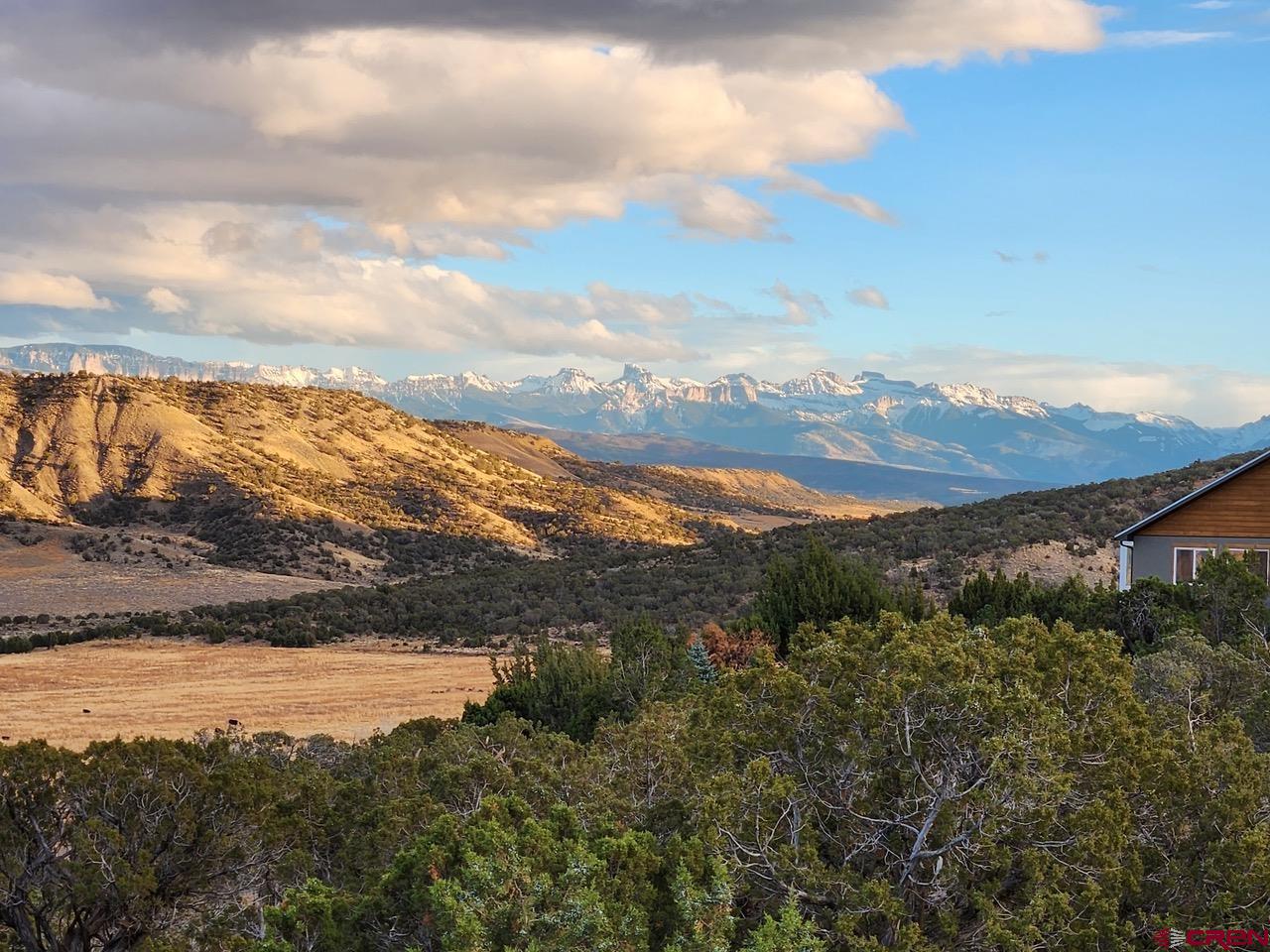 20891 Solitude Road Montrose, CO 81403 - Photo 39 of 39 a view of lake with mountain