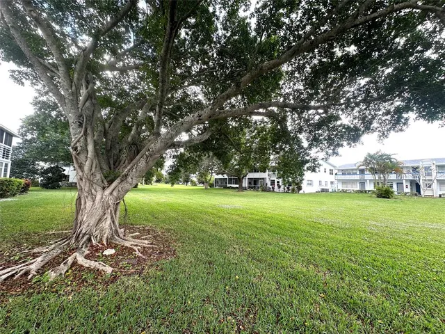 a view of a car parked in front of a house