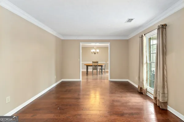 a view of a livingroom with wooden floor
