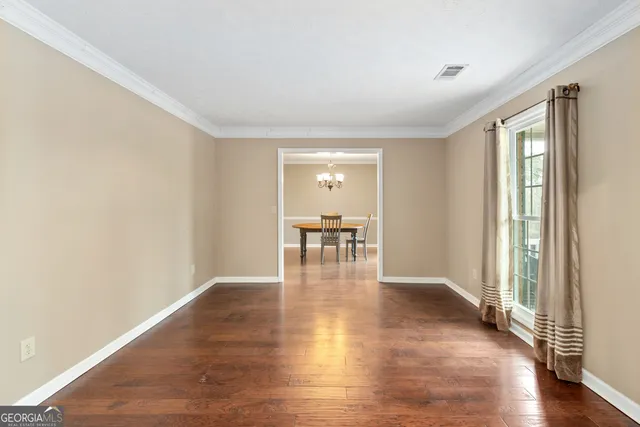 a view of a livingroom with wooden floor