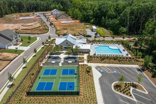 5385 Keepsake Court Cumming, GA 30040 - Photo 3 of 16 an aerial view of a house with swimming pool