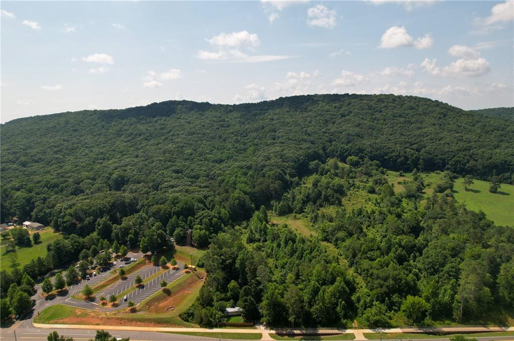 5385 Keepsake Court Cumming, GA 30040 - Photo 8 of 16 a view of a mountain in the distance in a field