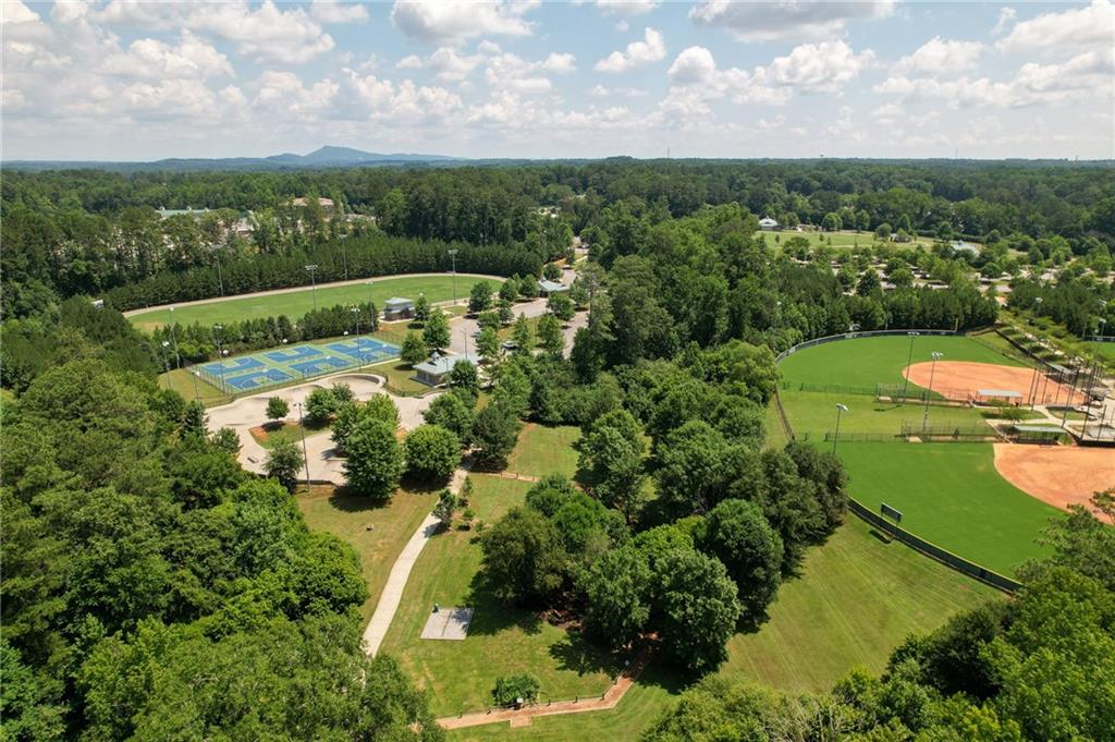 5385 Keepsake Court Cumming, GA 30040 - Photo 9 of 16 an aerial view of a house with a yard basket ball court and outdoor seating