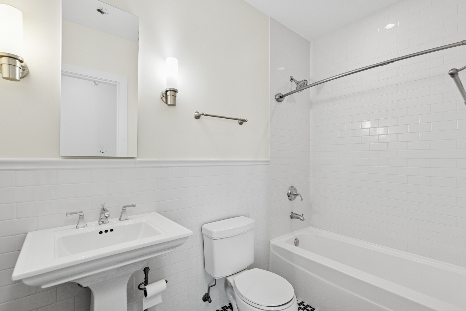 1570 Elmwood Avenue, Unit 1504 Evanston, IL 60201 - Photo 17 of 24 a bathroom with a sink toilet and shower