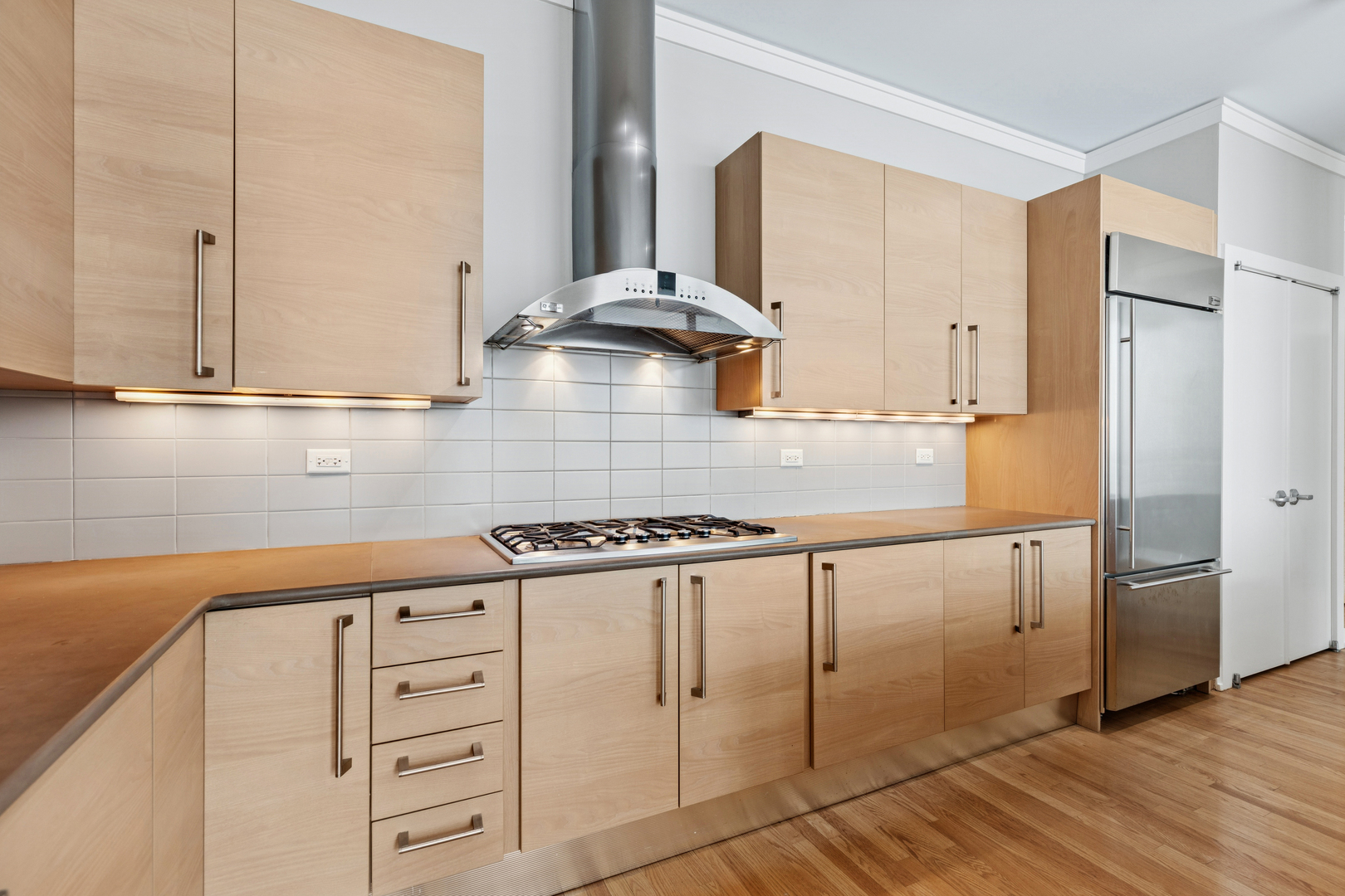 1570 Elmwood Avenue, Unit 1504 Evanston, IL 60201 - Photo 9 of 24 a kitchen with white cabinets and white appliances