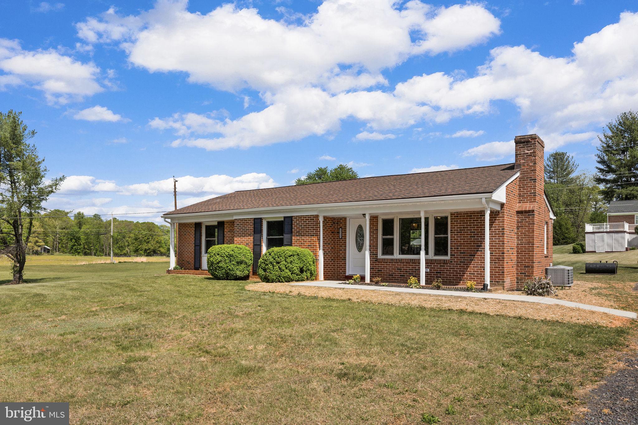 Charming brick home with scenic views.