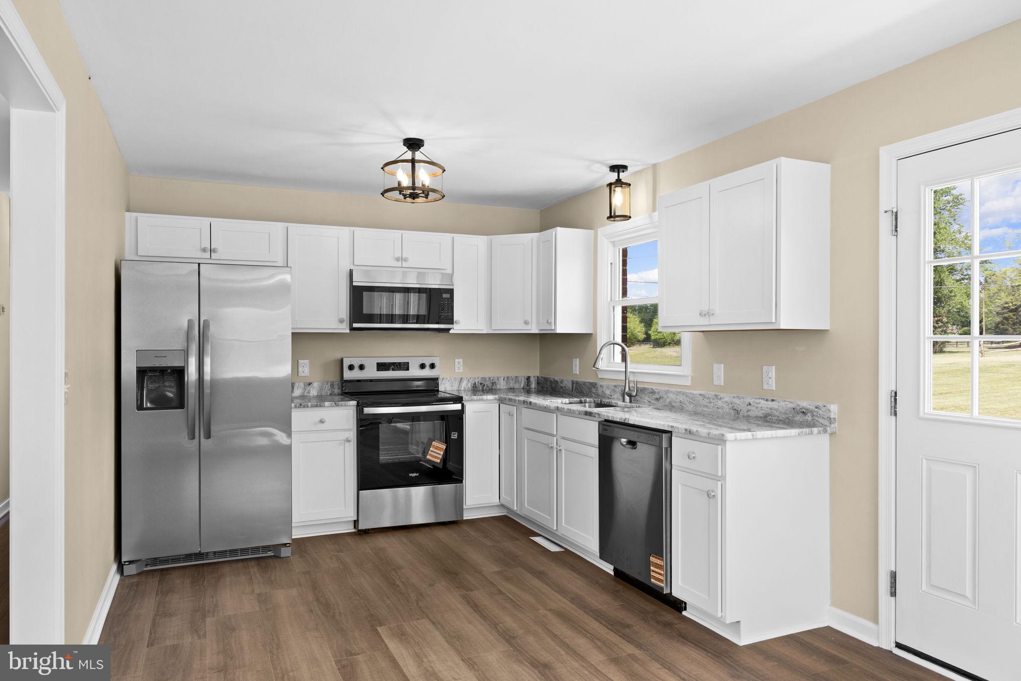12157 Octonia Road Orange, VA 22960 - Photo 16 of 45 Modern kitchen with sleek finishes.