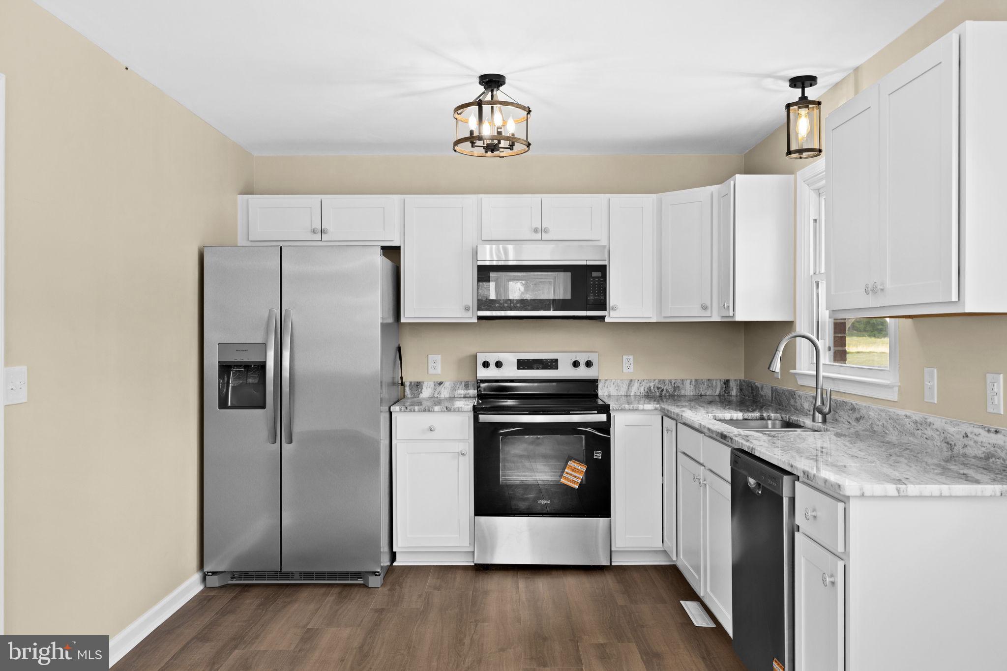 12157 Octonia Road Orange, VA 22960 - Photo 17 of 45 Modern kitchen with sleek finishes.