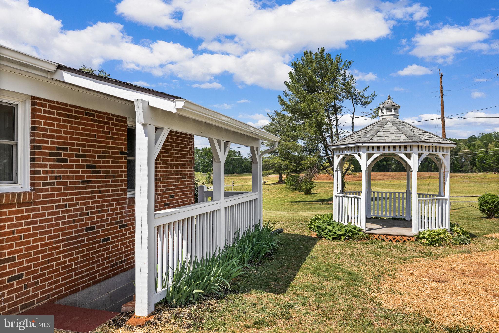 12157 Octonia Road Orange, VA 22960 - Photo 42 of 45 Charming gazebo beside a cozy home.