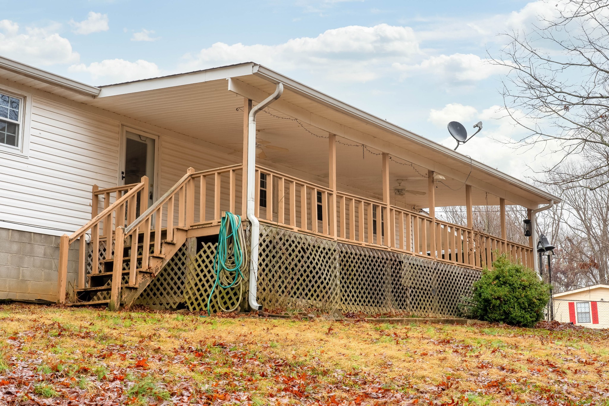 5945 Dividing Ridge Road Goodlettsville, TN 37072 - Photo 11 of 46 a view of a house with a fence