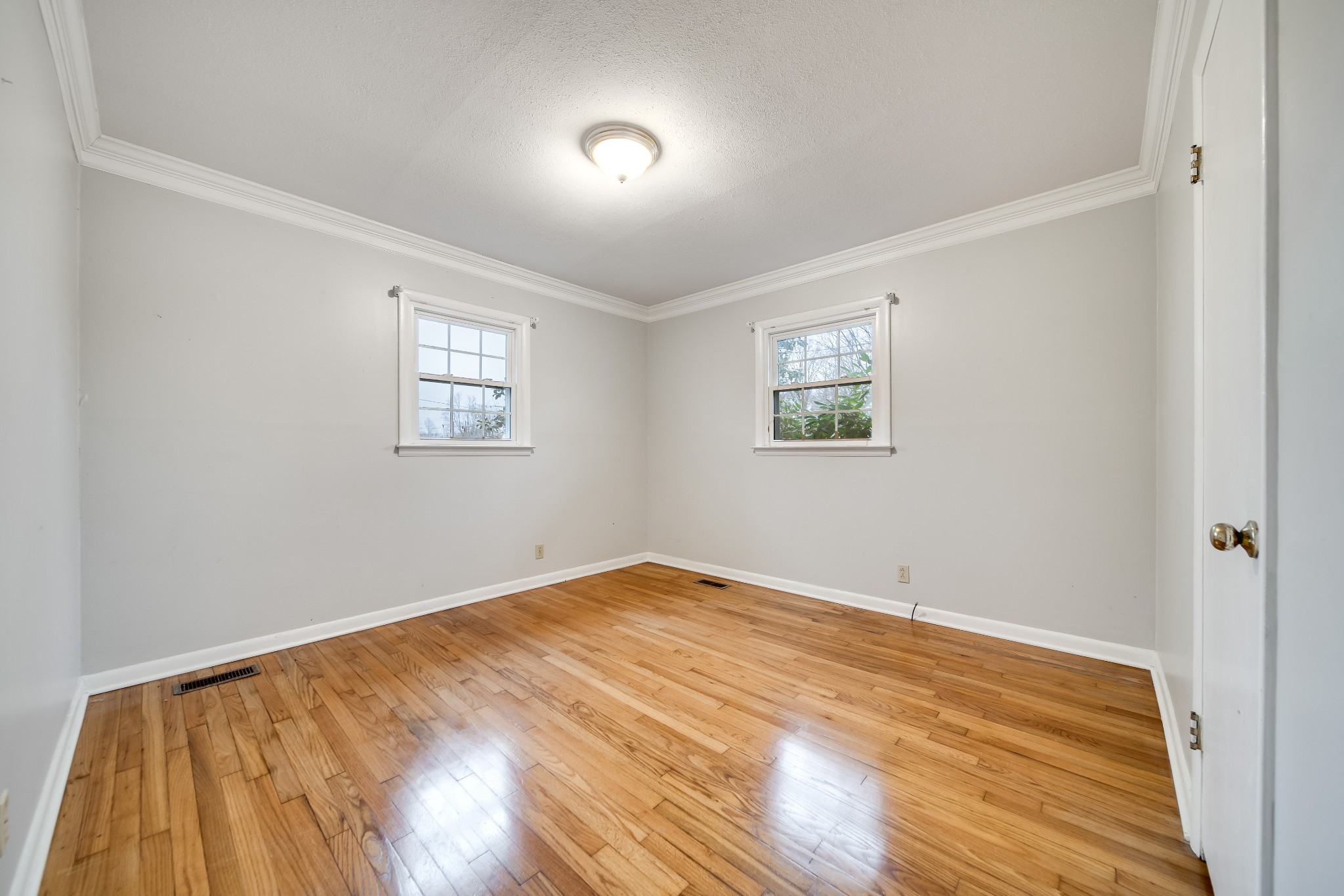 5945 Dividing Ridge Road Goodlettsville, TN 37072 - Photo 31 of 46 wooden floor in an empty room with a window