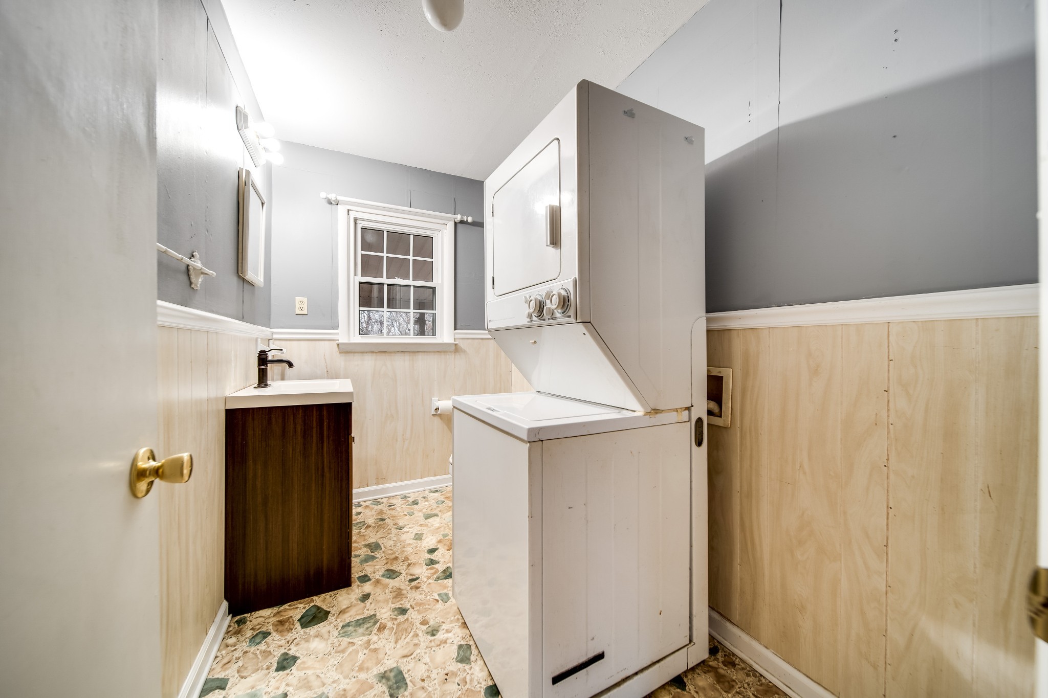 5945 Dividing Ridge Road Goodlettsville, TN 37072 - Photo 36 of 46 a bathroom with a sink and a mirror