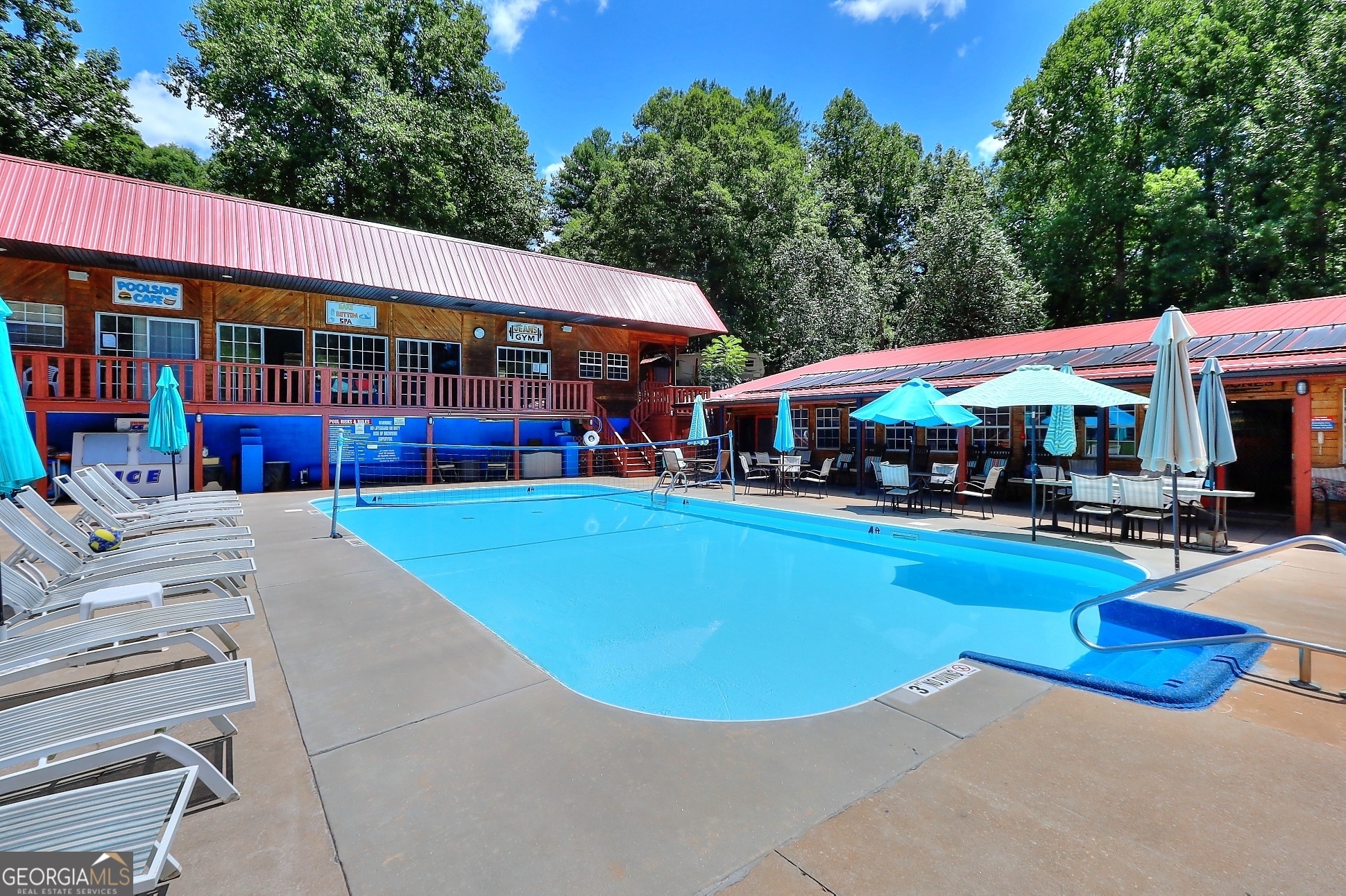 95 Cedar Hollow Road Cleveland, GA 30528 - Photo 2 of 54 a view of patio with swimming pool table and chairs