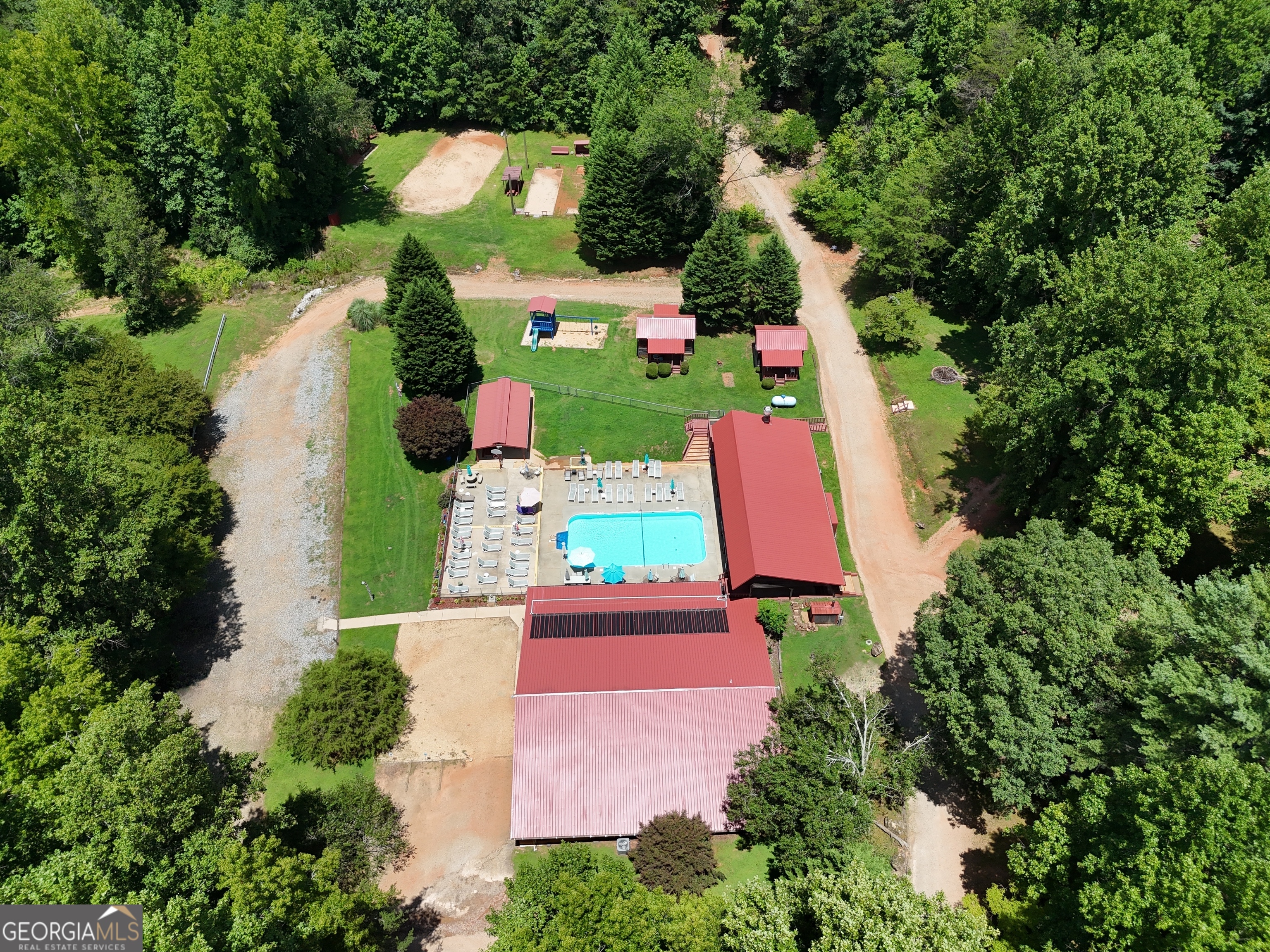 95 Cedar Hollow Road Cleveland, GA 30528 - Photo 27 of 54 an aerial view of house with yard swimming pool and outdoor seating
