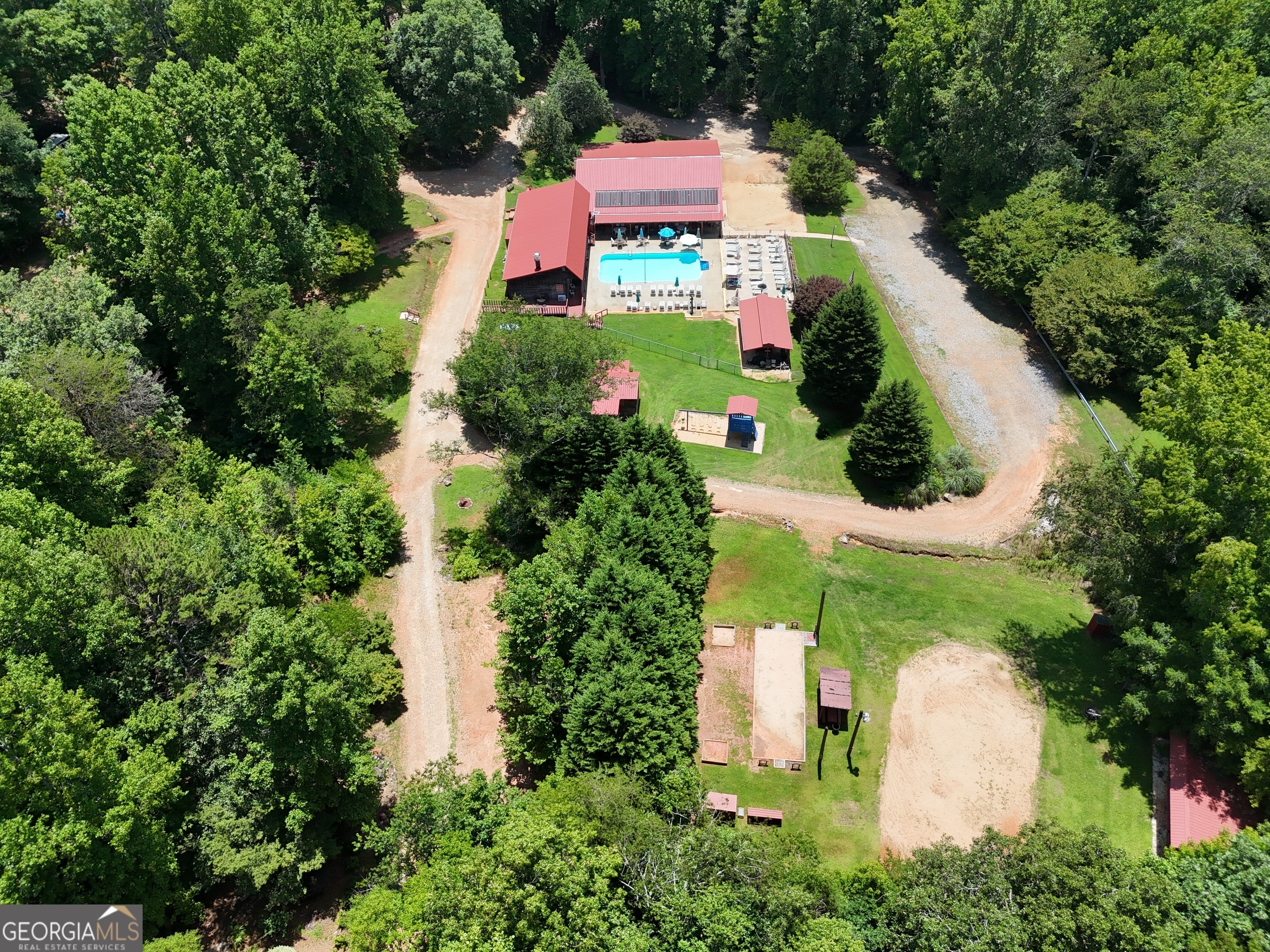 95 Cedar Hollow Road Cleveland, GA 30528 - Photo 28 of 54 an aerial view of a house with a yard and trees