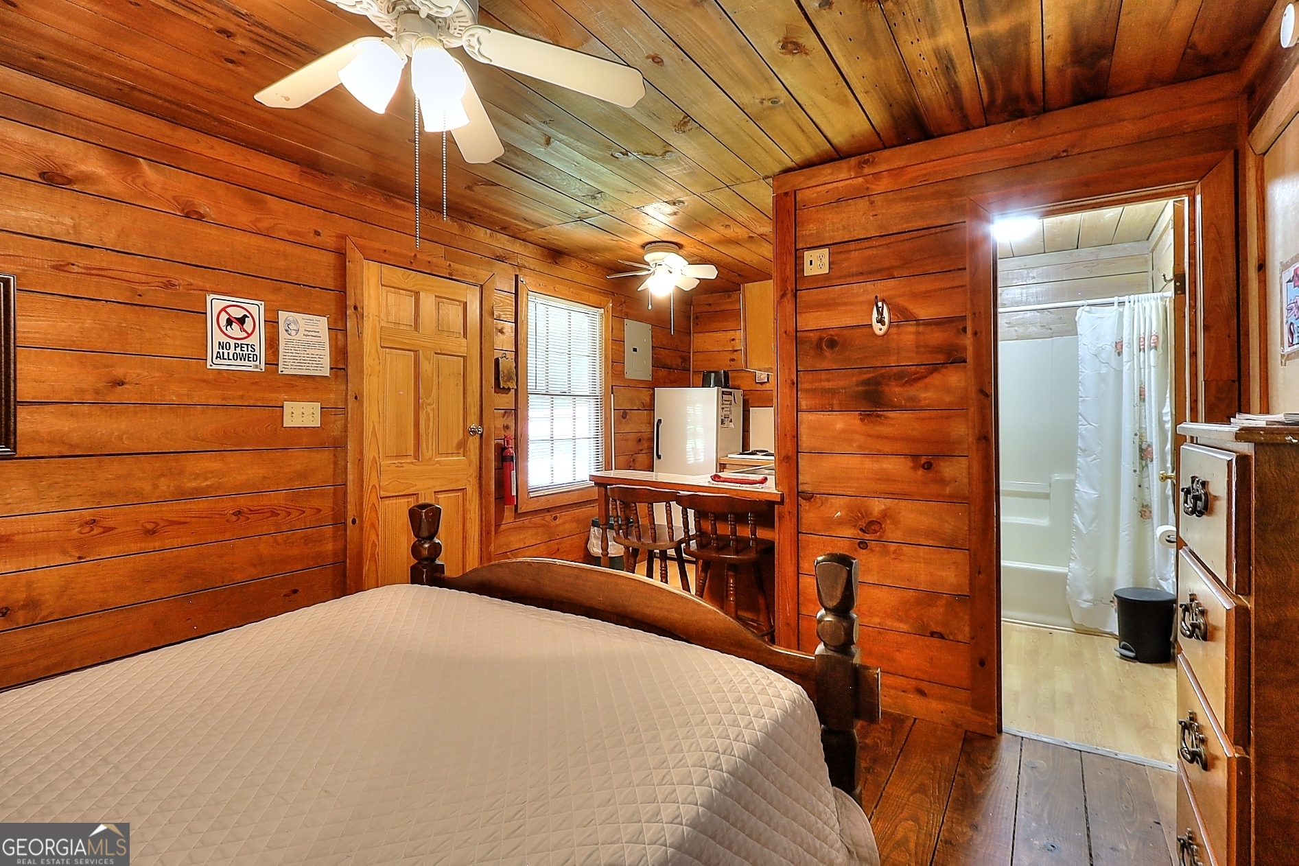 95 Cedar Hollow Road Cleveland, GA 30528 - Photo 33 of 54 a bedroom with a bed next to a window