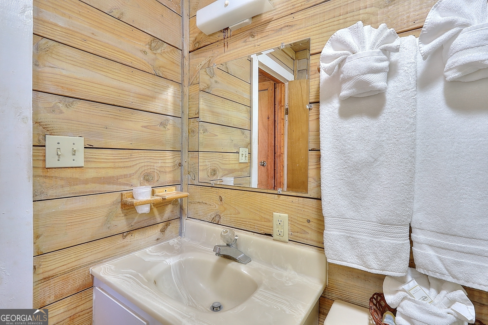 95 Cedar Hollow Road Cleveland, GA 30528 - Photo 37 of 54 a bathroom with a sink and a bathtub