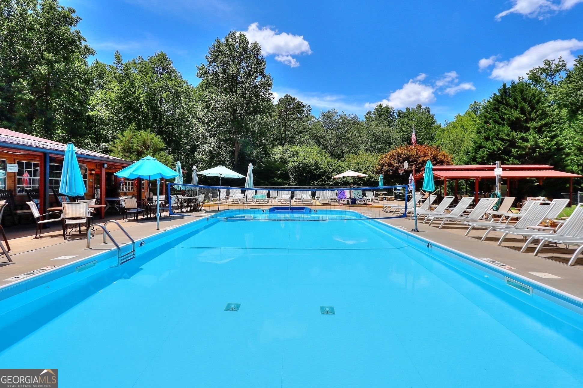 95 Cedar Hollow Road Cleveland, GA 30528 - Photo 5 of 54 a view of a swimming pool with chairs