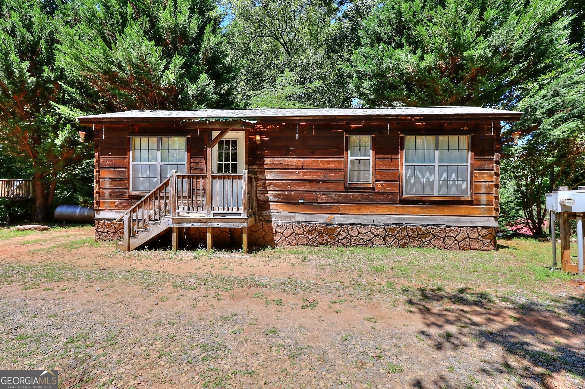 95 Cedar Hollow Road Cleveland, GA 30528 - Photo 51 of 54 a front view of a house with a yard