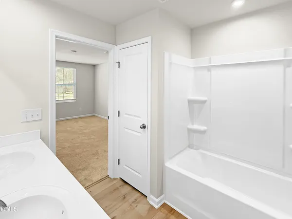 a bathroom with a sink toilet and vanity