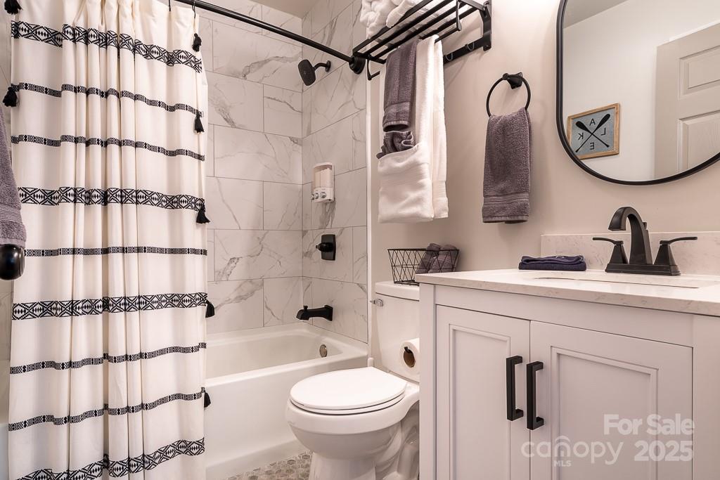 8410 Slate Street Terrell, NC 28682 - Photo 19 of 38 a bathroom with a sink and a mirror