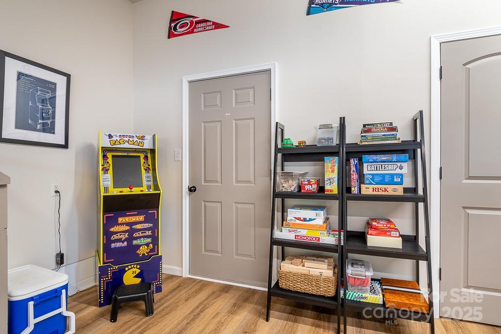 8410 Slate Street Terrell, NC 28682 - Photo 25 of 38 a room with lots of books and a book shelf