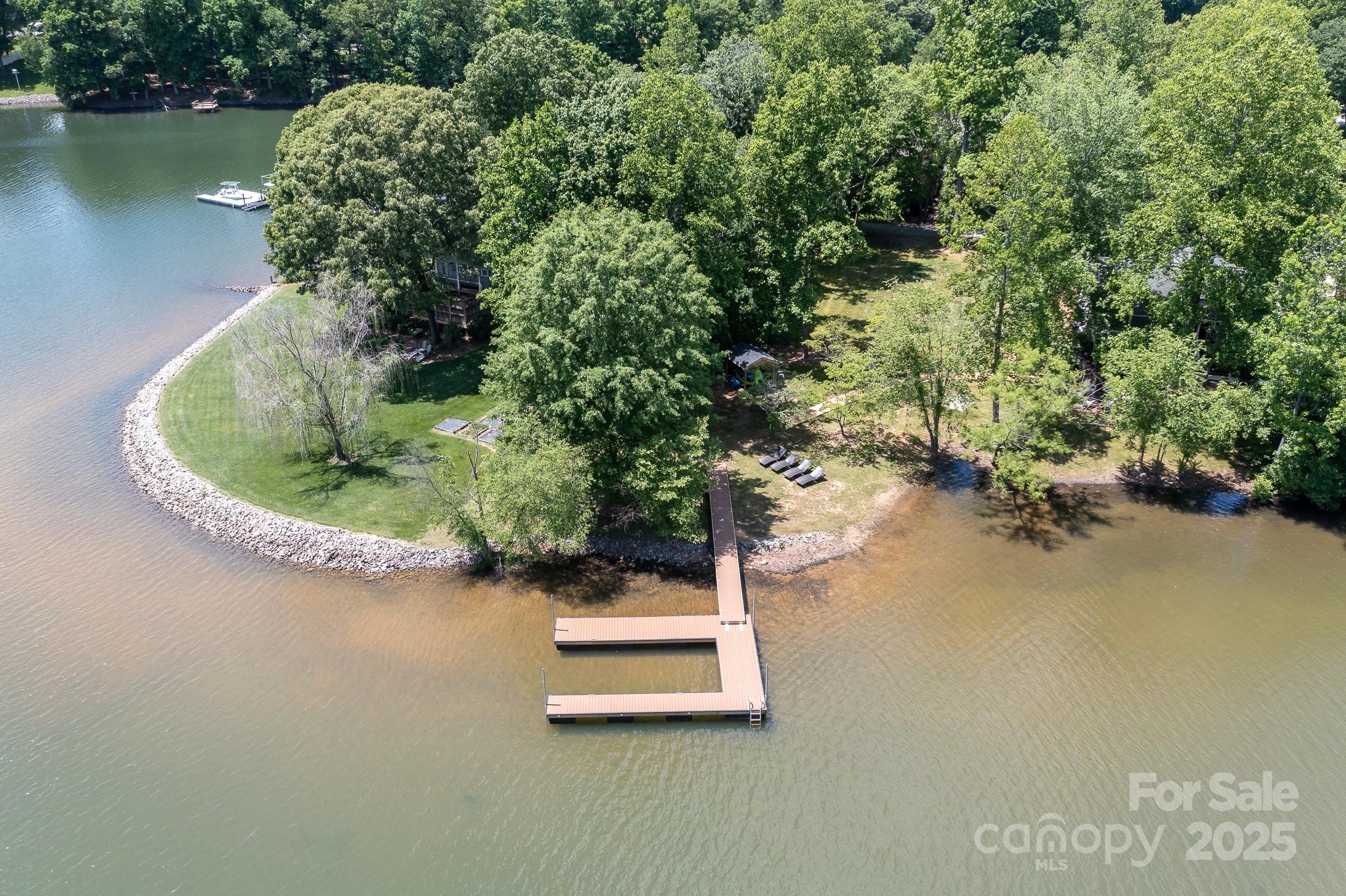 8410 Slate Street Terrell, NC 28682 - Photo 34 of 38 a small pool with trees in the background