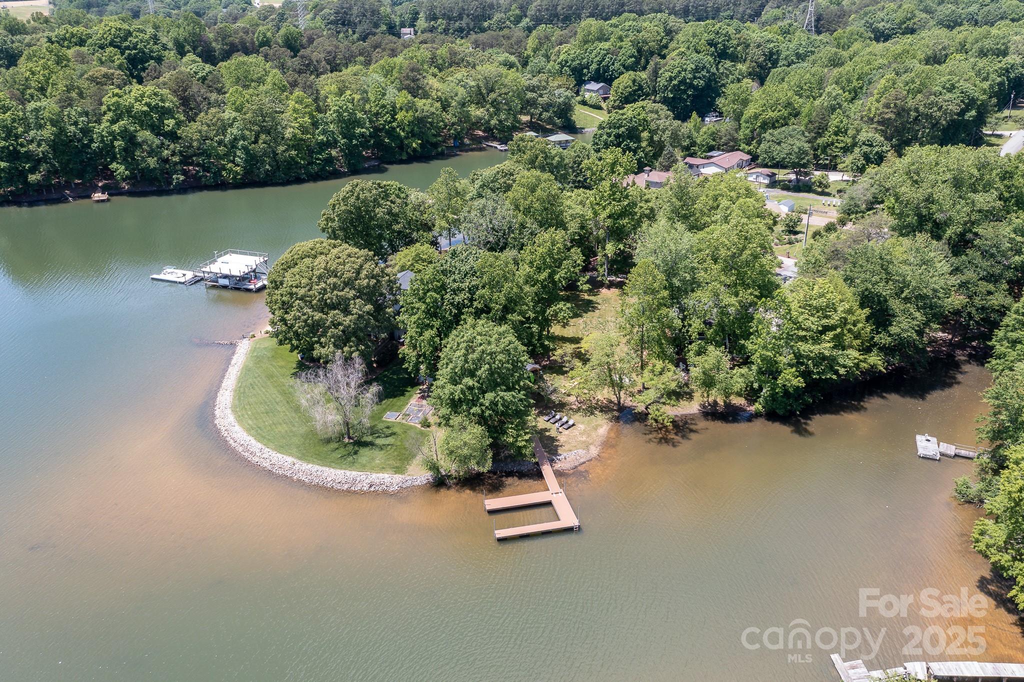8410 Slate Street Terrell, NC 28682 - Photo 36 of 38 an aerial view of a house with a yard and lake view