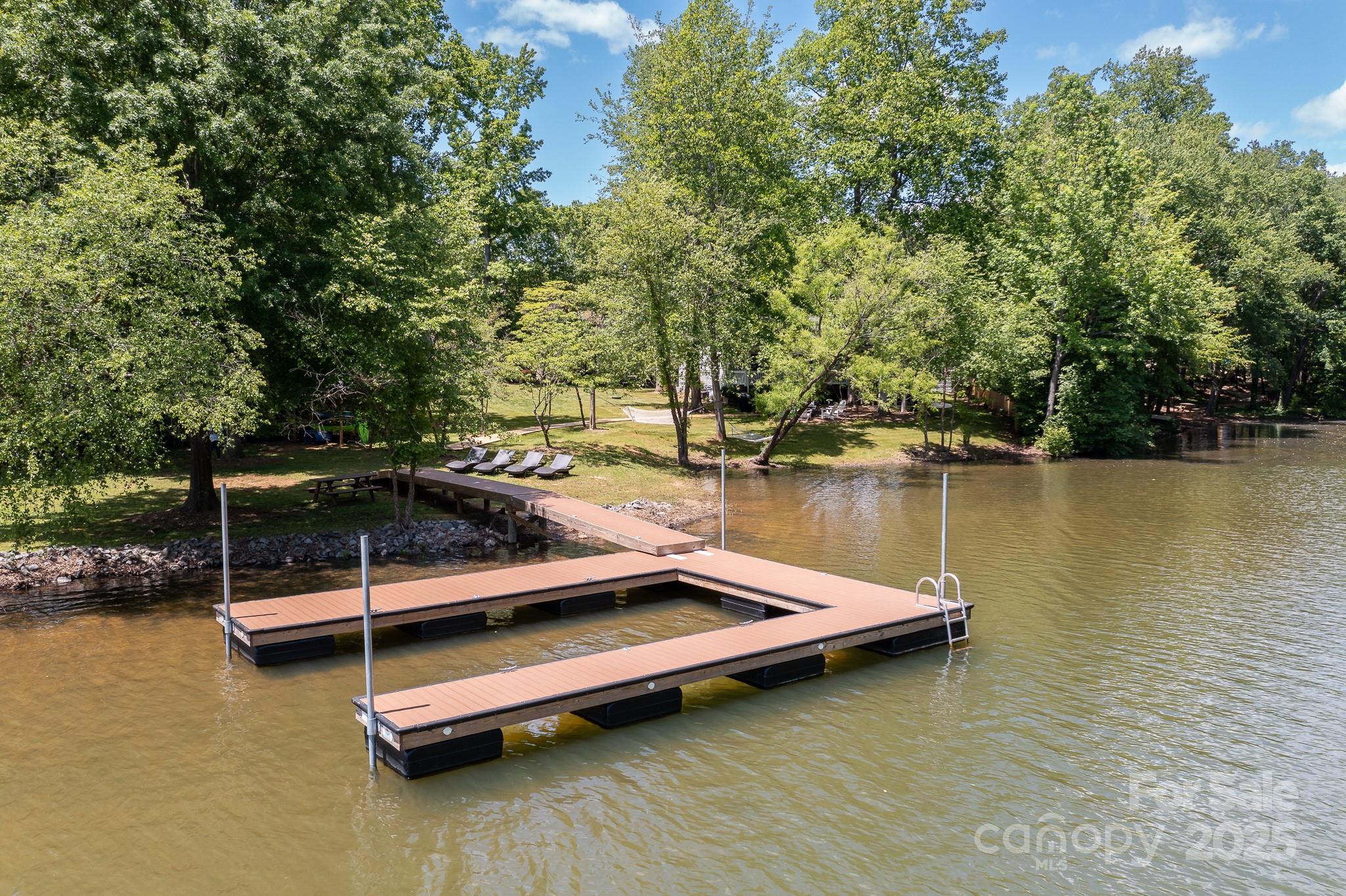 8410 Slate Street Terrell, NC 28682 - Photo 4 of 38 a lake view with boat and trees