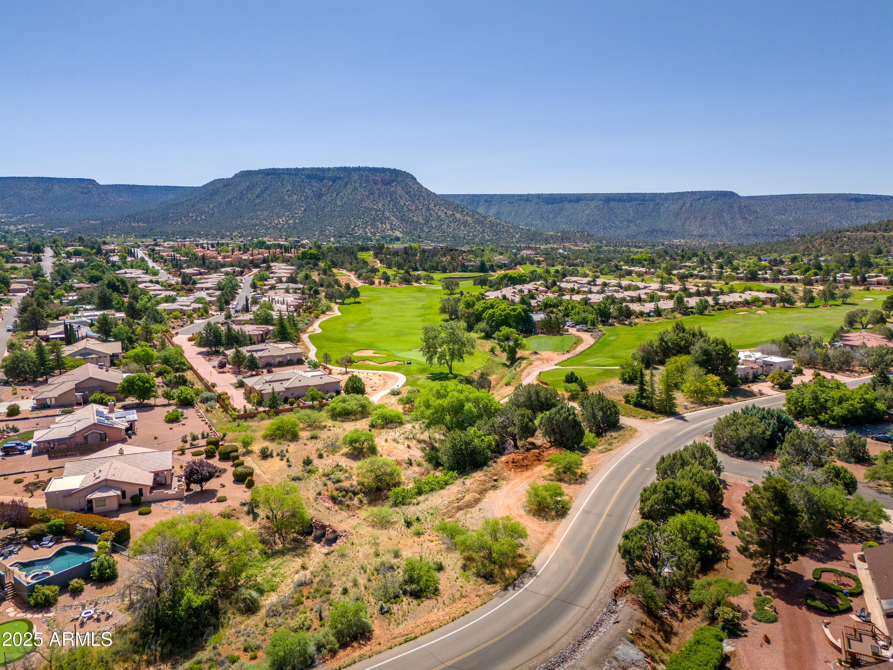 105 East Saddlehorn Road, Unit 161 Sedona, AZ 86351 - Photo 13 of 33 a view of a city with mountains in the background