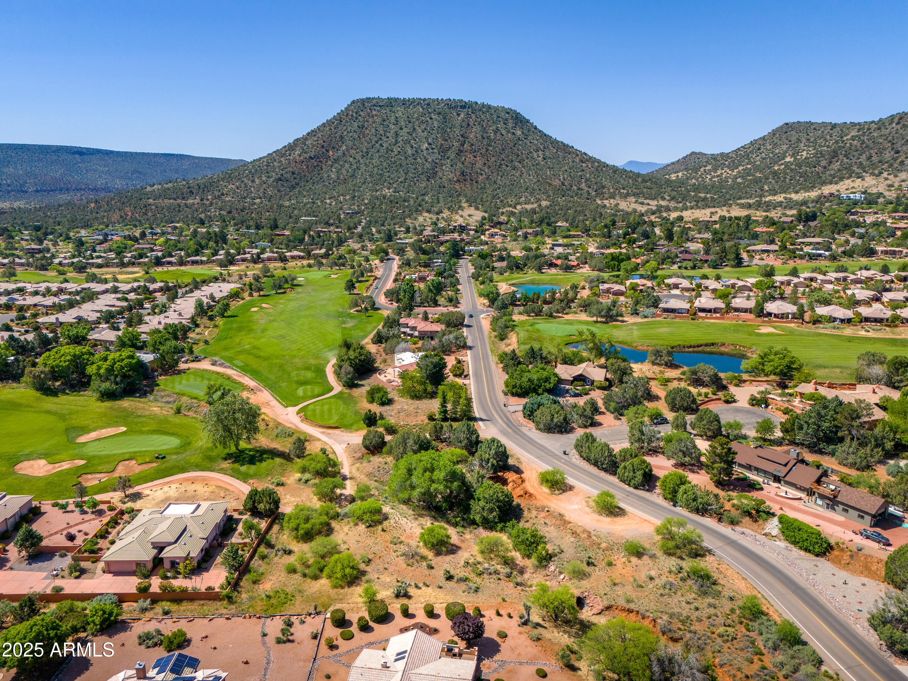 105 East Saddlehorn Road, Unit 161 Sedona, AZ 86351 - Photo 14 of 33 a view of a city with mountains in the background