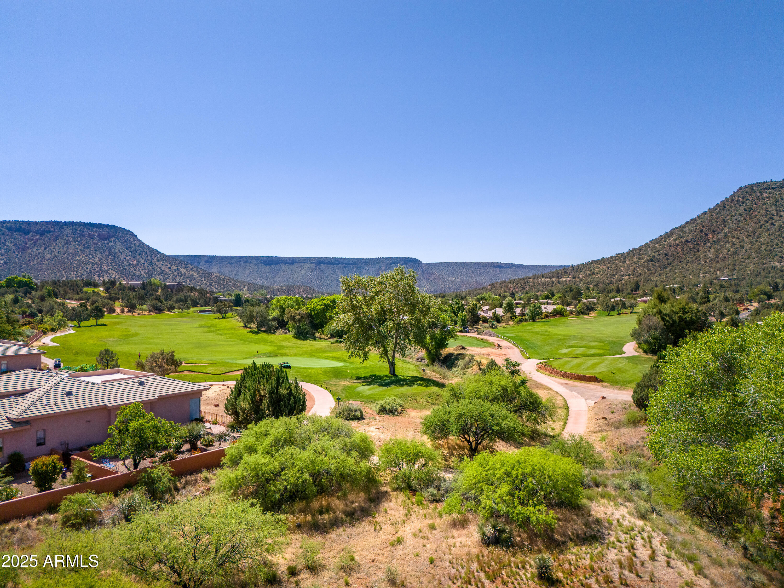 105 East Saddlehorn Road, Unit 161 Sedona, AZ 86351 - Photo 16 of 33 a view of a city with mountains in the background