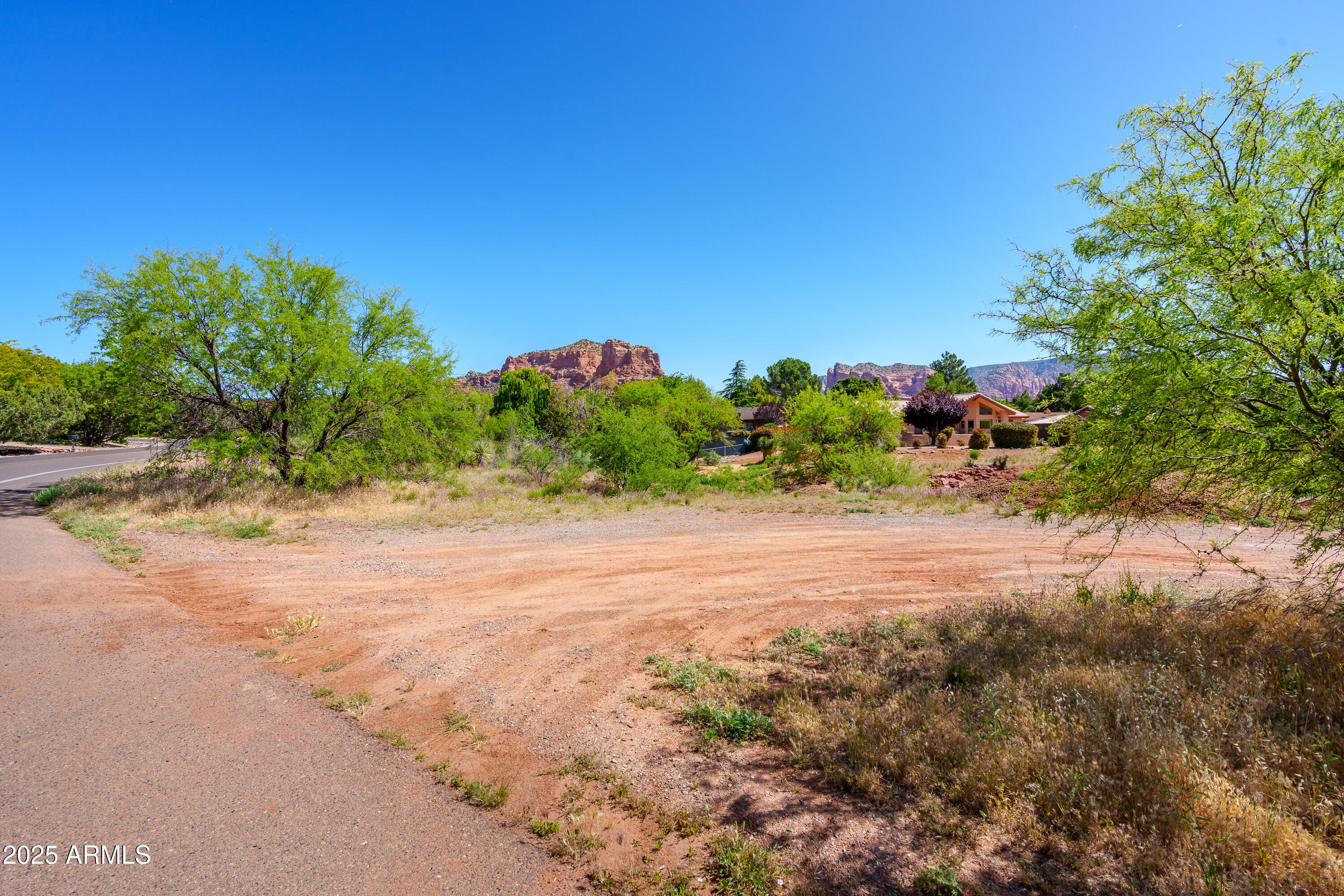 105 East Saddlehorn Road, Unit 161 Sedona, AZ 86351 - Photo 18 of 33 a view of a yard with a tree