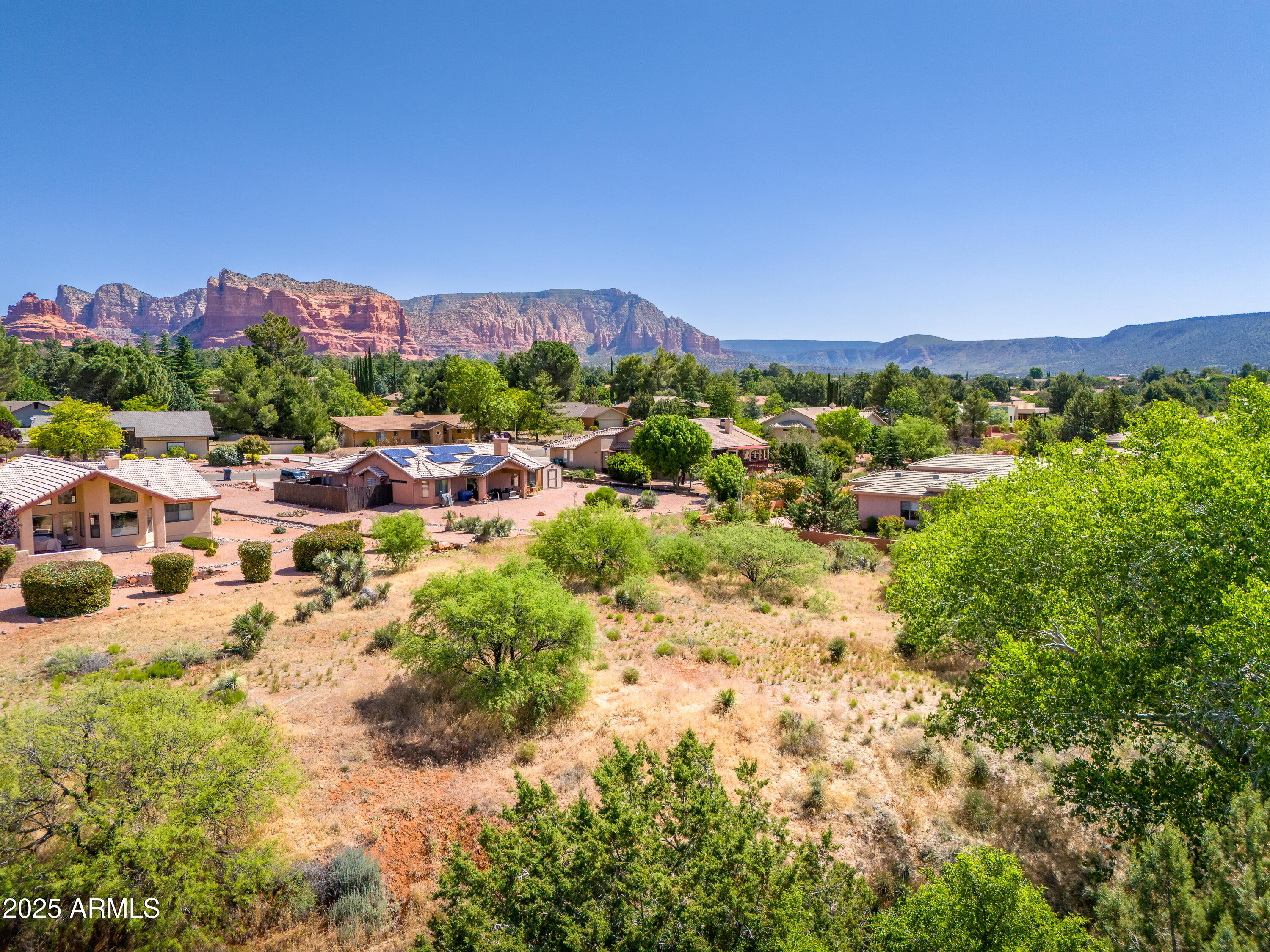 105 East Saddlehorn Road, Unit 161 Sedona, AZ 86351 - Photo 31 of 33 a view of a city with lush green forest