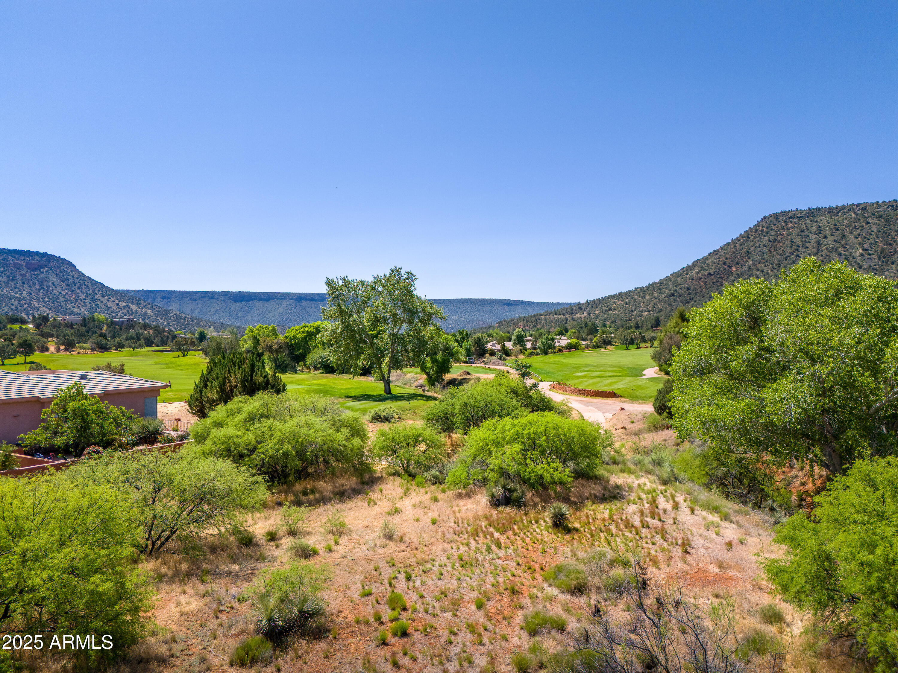 105 East Saddlehorn Road, Unit 161 Sedona, AZ 86351 - Photo 10 of 33 a view of a bunch of plants and trees