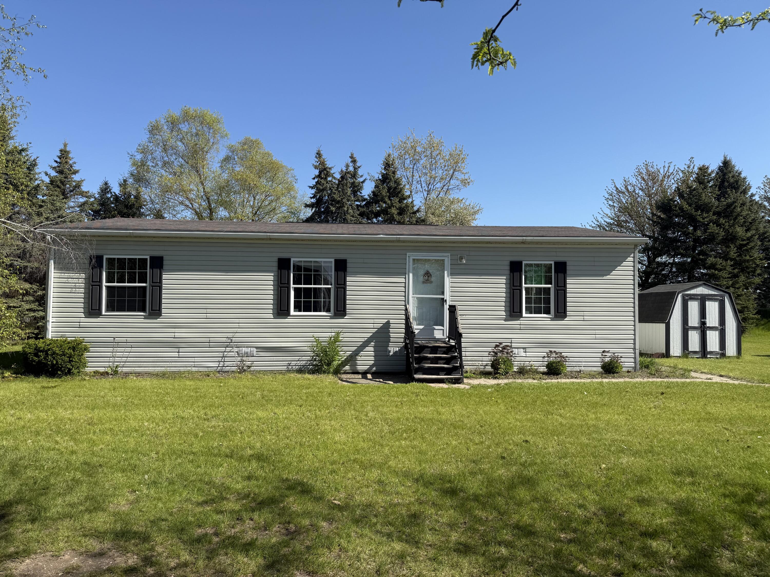 360 East Tuttle Road, Unit 8 Ionia, MI 48846 - Photo 1 of 46 IMG_1351