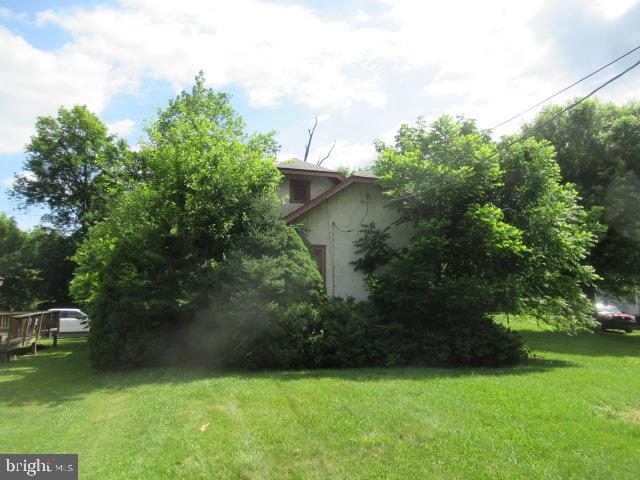 26 Potomac Drive Keyser, WV 26726 - Photo 4 of 15 a backyard of a house with lots of green space